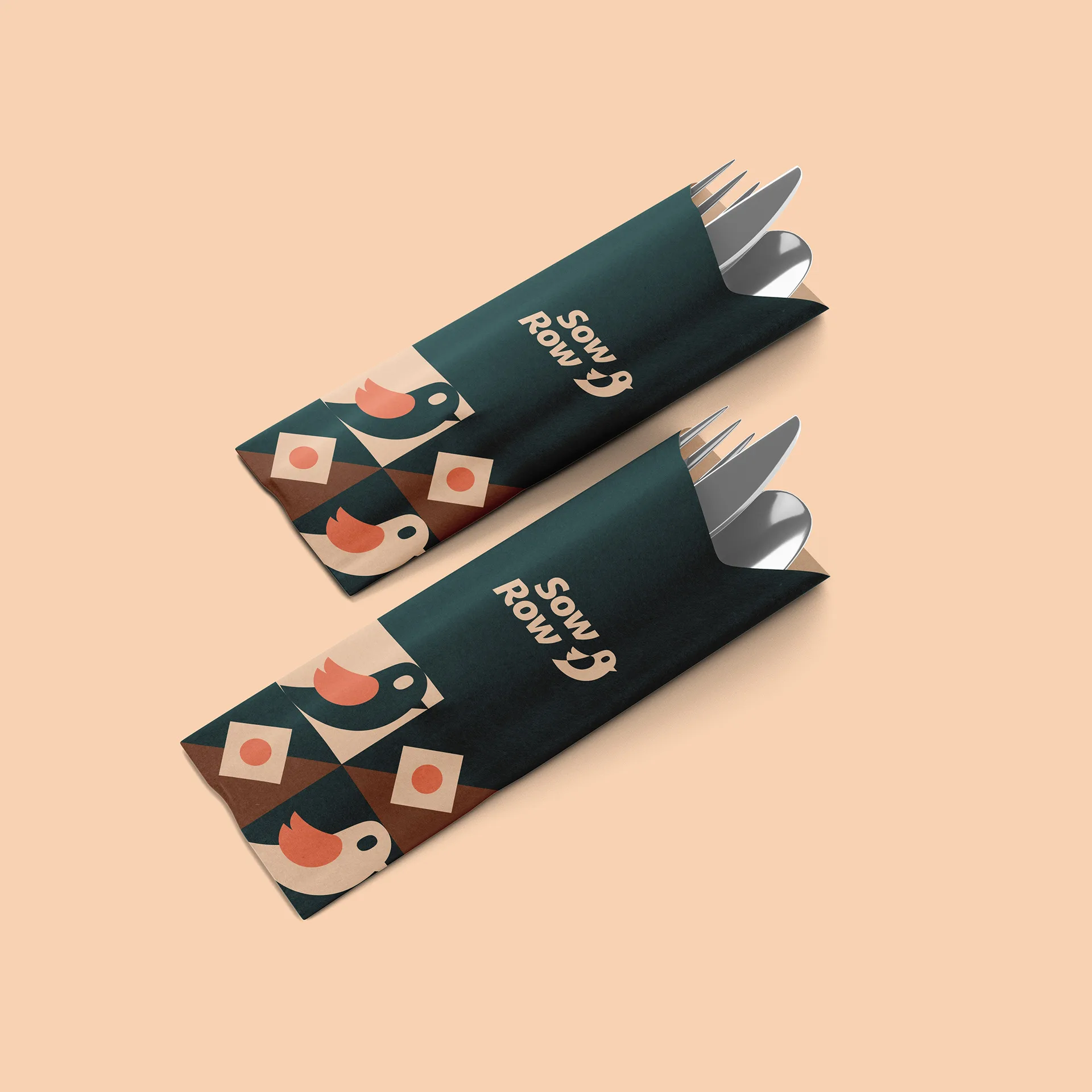 Sow Row — two patterned takeaway sleeves on peach