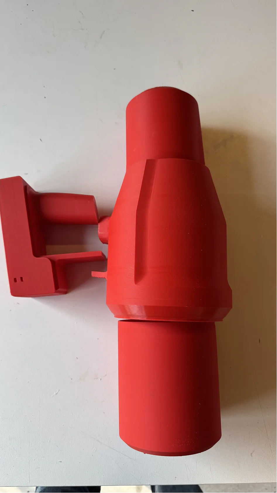 Luma — red printed wall dock, revised angle